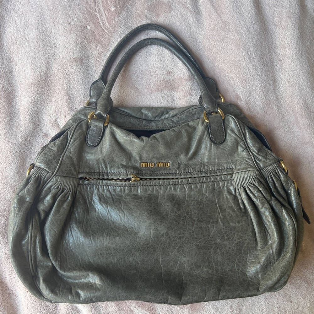 Mui Mui Distressed leather bag